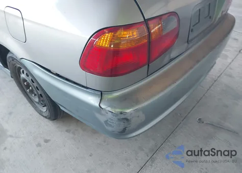 1999 Honda Civic Lx z USA, uszkodzony, nr VIN 2HGEJ6673XH568115